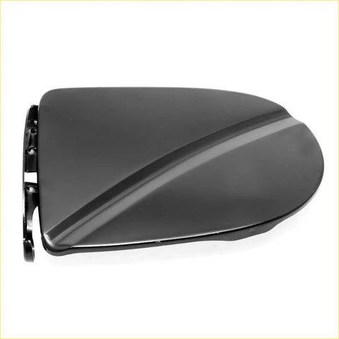 Black glossy plastic gas fuel door cover for Nissan Navara King Cab D40 2005-2014 showing back side with bracket