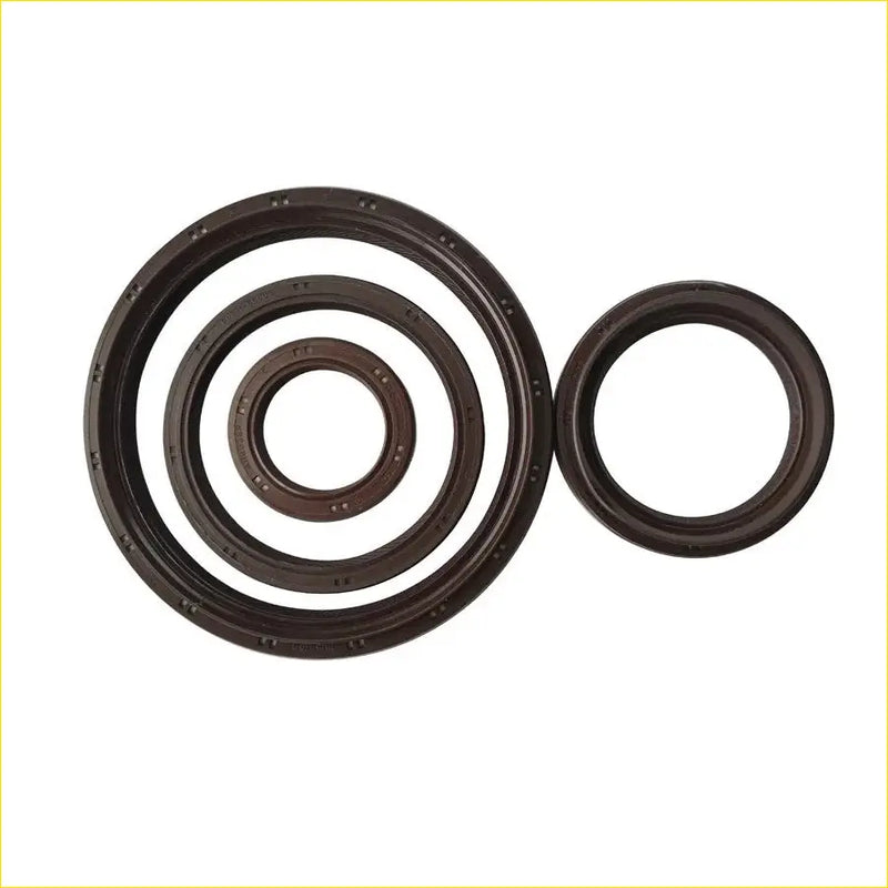 Set of four dark brown rubber crankshaft oil seals with textured edges for toyota land cruiser and hilux pickup