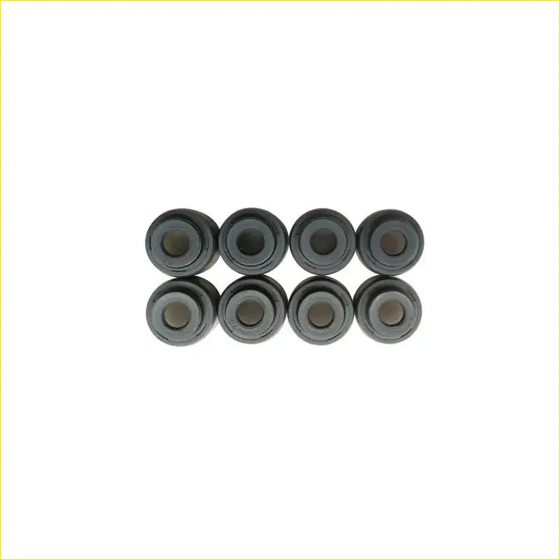 Eight black rubber valve stem oil seal bushings in two rows for toyota starlet 1.5 d np80 diesel engine
