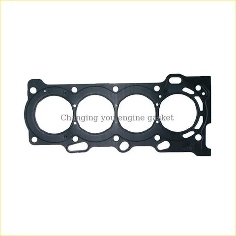 Black rubber engine head gasket with four circular holes and mounting points for toyota rav4 corolla avensis 16v engines