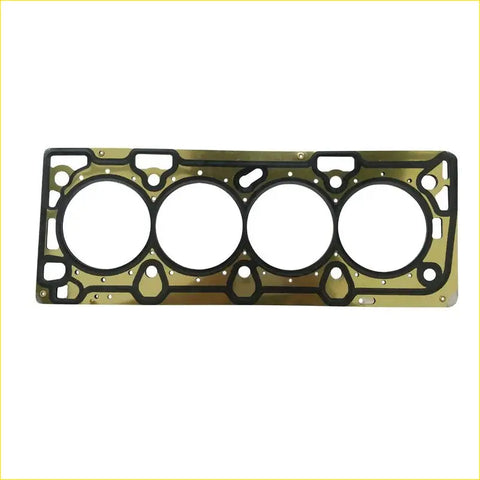 Gold-colored metal engine head gasket with four circular openings and black rubber seals for chevrolet orlando