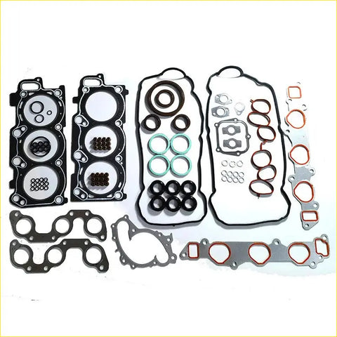Black green and red rubber gaskets with metal parts neatly arranged for gasket pro 3mzf toyota avalon camry solara full set