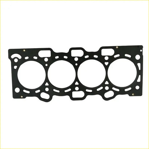 Black metal cylinder head gasket with four circular openings and intricate cutouts for mitsubishi carisma lancer v mirage