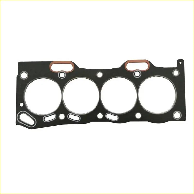 Black engine head gasket with four circular openings and copper tabs for toyota paseo 16v 5EFE 4EFE engines