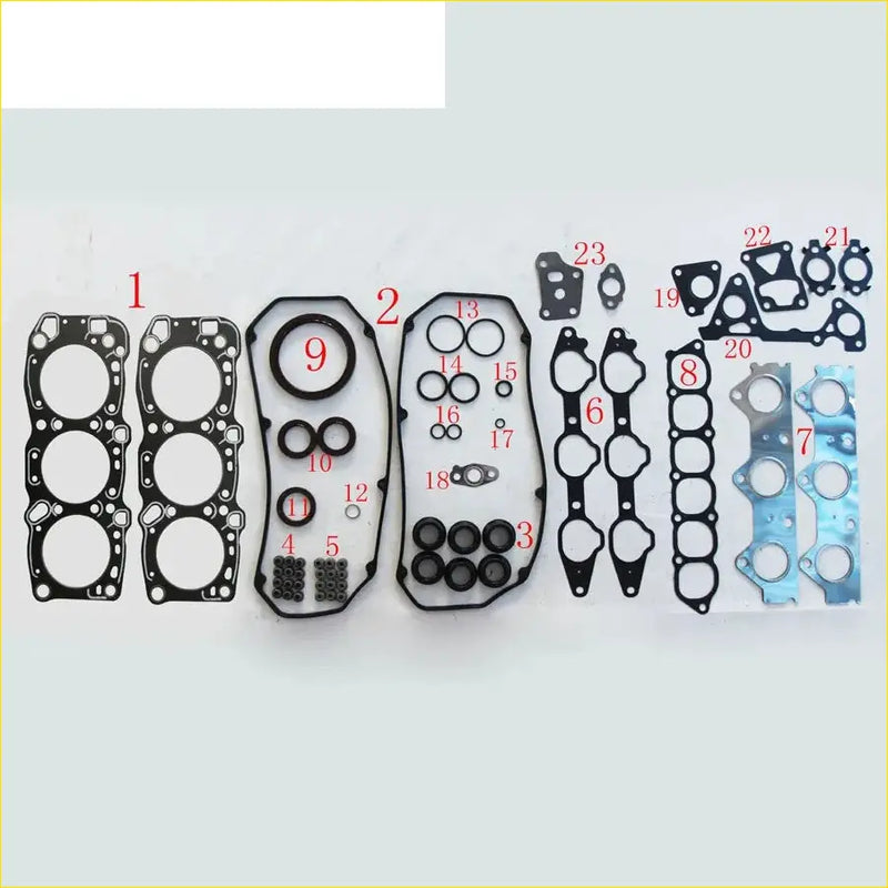 Black rubber gasket set with various shapes and sizes for mitsubishi montero sport pajero engine components