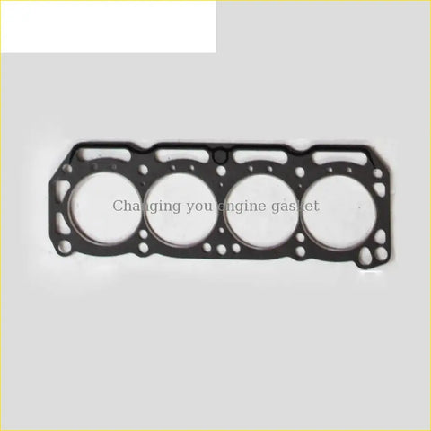 Black engine head gasket with four circular openings and edge holes for nissan vanette sunny 1.4 1.5l cylinder head gasket