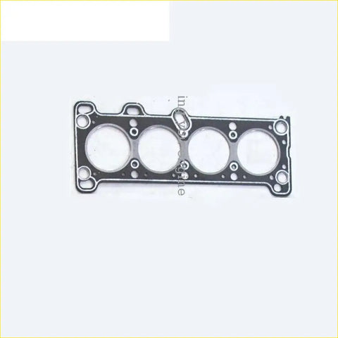 Black engine head gasket with four circular openings and metallic border for kia pride mazda 323 1.3L cylinder head