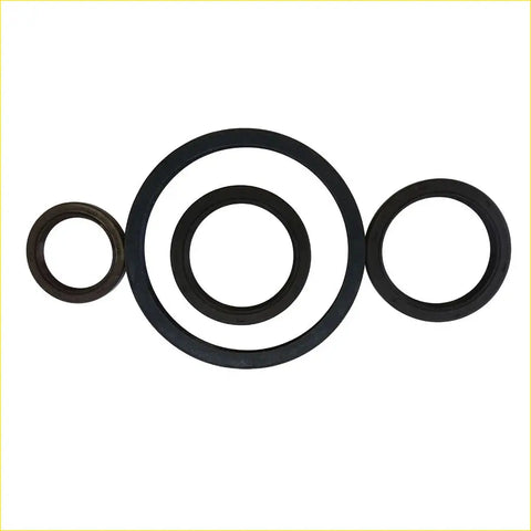 Three black rubber crankshaft oil seals of varying sizes for volvo s40 s80 c70 by gasket pro
