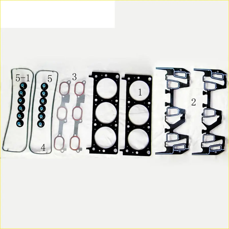 Black engine head gasket set with circular cutouts and bolt holes featuring a matte finish for chevrolet lumina beretta 3.1 16v