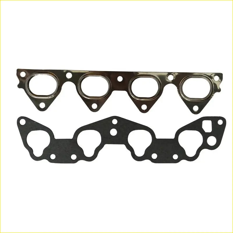 Black and metallic engine head gaskets with four circular openings for precise fitment on Honda Concerto or Civic ZC D16Z2 D15B intake exhaust manifold