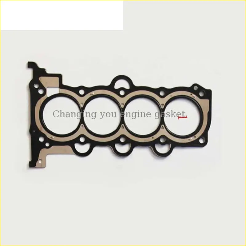 Black and beige engine head gasket with four circular openings for hyundai or kia cerato ii g4fc cylinder head gasket use