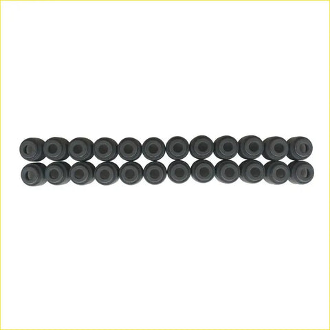 Black rubber grommets arranged in two rows for gasket pro mitsubishi outlander ii valve stem oil seal gasket md307342