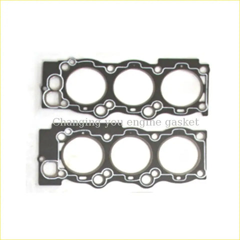 Black engine head gasket set with three circular openings and precise cutouts for toyota camry 3vzte 24v cylinder heads