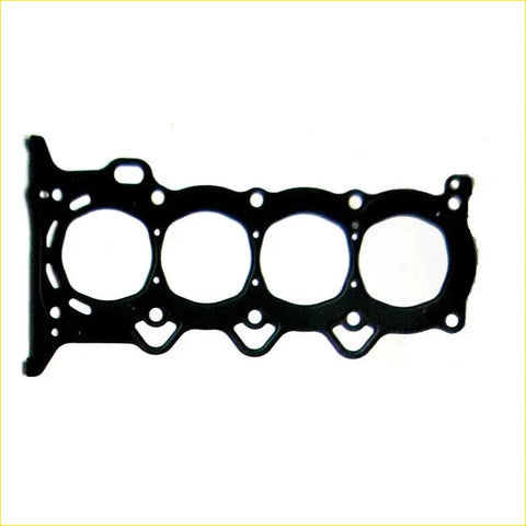 Black rubber metal cylinder head gasket with four circular openings and bolt holes for toyota prius corolla yaris engine