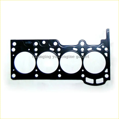 Black metal cylinder head gasket with four circular openings and molded design for toyota yaris daihatsu terios engines