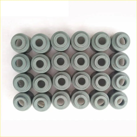 Gray rubber grommets arranged in a grid for gasket pro g6cu hyundai terracan valve stem oil seal set 24pcs