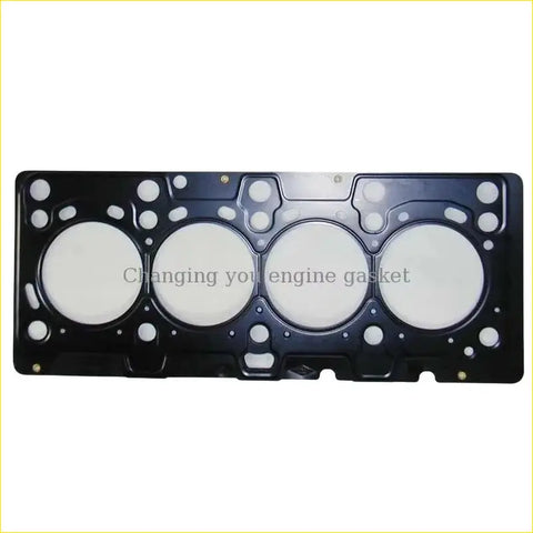 Black metal cylinder head gasket with four white circular openings and textured surface for nissan micra renault clio ii kangoo