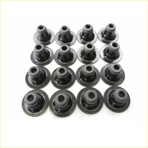 Black rubber valve stem oil seal grommets arranged in grid for gasket pro s4ph lotus l3 16pcs set