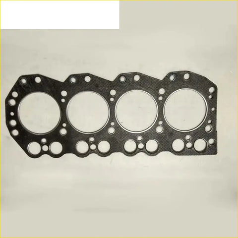 Black textured engine head gasket with four large openings for gasket pro td23 nissan urvan 23l e24