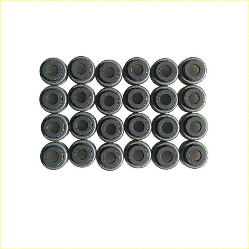 Set of twenty black metal valve stem oil seals for toyota cressida gasket pro 1g-fe engine use arranged in grid