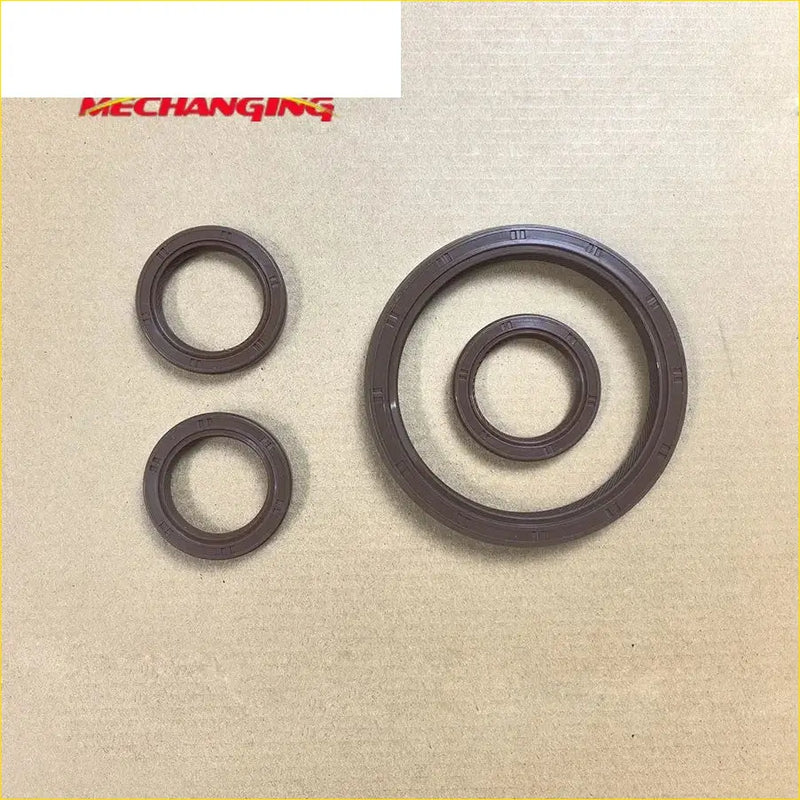 Set of three dark brown rubber crankshaft oil seals with molded ridges for VG30E Nissan Maxima II and Navara Quest
