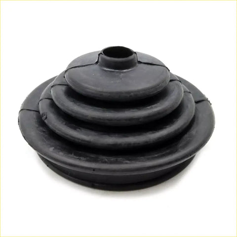 Black rubber cv joint boot with concentric ridges and central opening for gear lever cover shift boot mazda familia