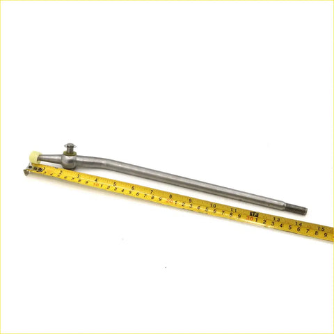 Silver metal gear shift lever for nissan datsun 720 sd23 1979-1986 with threaded end and spherical joint next to tape measure