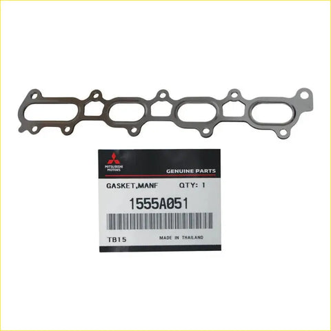 Metallic gray mitsubishi motors genuine exhaust manifold gasket with oval and rectangular cutouts for triton mn 4d56 engine