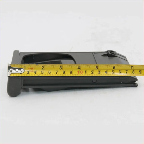 Black plastic car seat base with molded contours and textured surface for gray dash cup holder toyota hilux 2004-2015