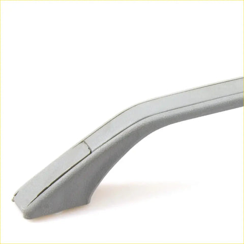 Gray plastic roof lining rail handle with smooth curved design and subtle ridges for nissan bigm 850 navara hustler
