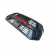 Black toyota gr sport front grille with red lettering and orange accent lights for hilux 2024 sr sr5