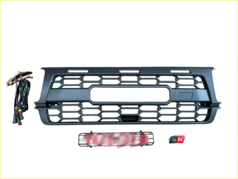 Black honeycomb-patterned front grille for toyota land cruiser fj80 1990-1997 with integrated license plate area and hardware