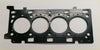 Black engine head gasket with four circular openings and matte finish for movano master x220d x250d navara nv400