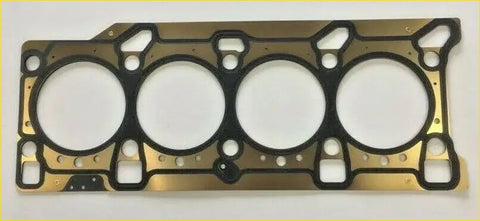 Gold-colored head gasket for wrangler liberty cherokee with black rubber seals and precise cylinder head cutouts