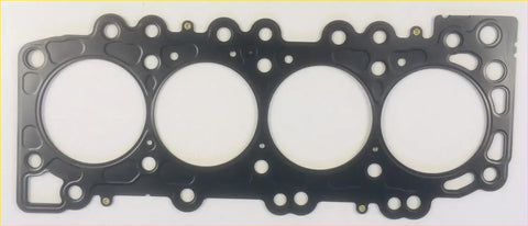 Black rubber head gasket with four large circular openings and smaller holes for navara d22 d40 pathfinder 25 dci engines