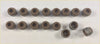 Brown rubber grommets arranged in two rows on white surface for head gasket set for wrangler liberty cherokee nitro