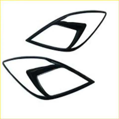 Black glossy finished headlight cover trim for bt50 made of high quality abs uv treated plastic with sleek angular design