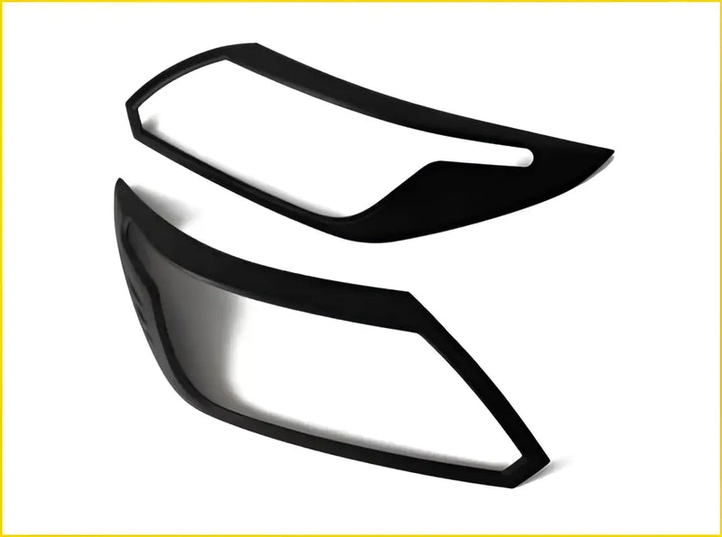 Black plastic headlight cover trim pieces for colorado trailblazer 2017 to 2019 shown from the back side