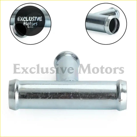 Chrome finished metal t shaped heater hose output fitting with polished reflective surface and threaded ends for toyota land cruiser