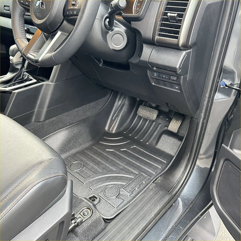 Black rubber heavy duty floor mat with molded contours and textured surface for mitsubishi triton 2024+