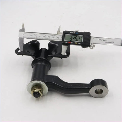 Black metal idler arm with silver bolt and machined steel parts for nissan d21 navara td25 2.5l 1985-1999