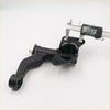 Black cast iron idler arm for nissan d22 crew cab 1997-2004 with silver bolt and digital caliper measuring 3.263 inches