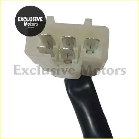 White plastic electrical connector with three silver terminals and black cable on ignition barrel key lock switch for nissan d21