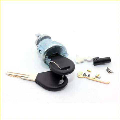 Black plastic key fob with metallic key attached to silver ignition cylinder switch for nissan d21 pathfinder 1986-1994