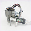 Gray metallic car power window motor with multicolored wiring and digital caliper showing 29 mm for mazda bravo lock set