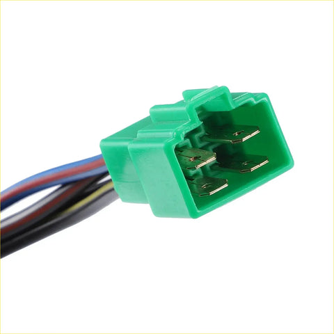Green plastic ignition starter switch key connector with four metal terminals and multi-colored wires for toyota land cruiser