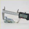 Silver metallic ignition switch barrel lock cylinder for toyota hilux 1978-1983 being measured with digital caliper
