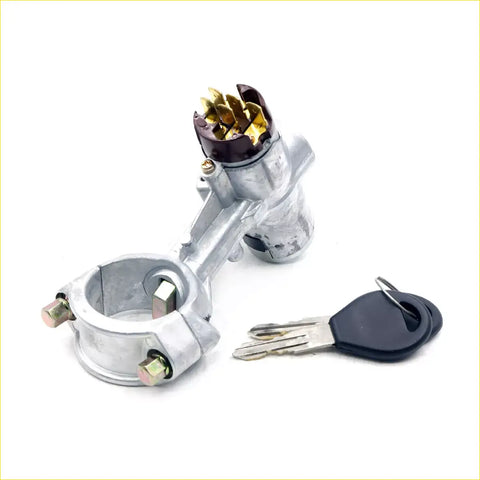 Silver metal ignition switch lock with brass keyhole and two black keys for nissan pathfinder terrano terramax mt
