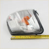 Clear plastic indicator corner light with orange ribbed lens and black housing for toyota hilux ln166 d4d 2001-2004