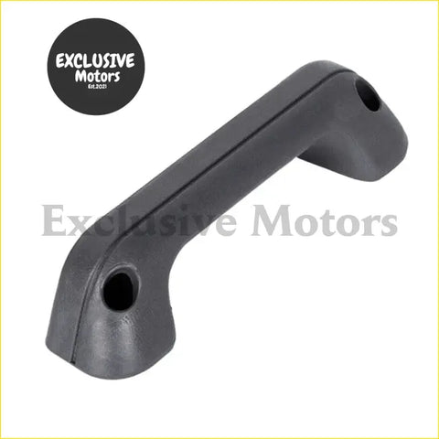Black plastic interior armrest door pull handle with smooth curved design and two mounting holes for nissan d21 back side